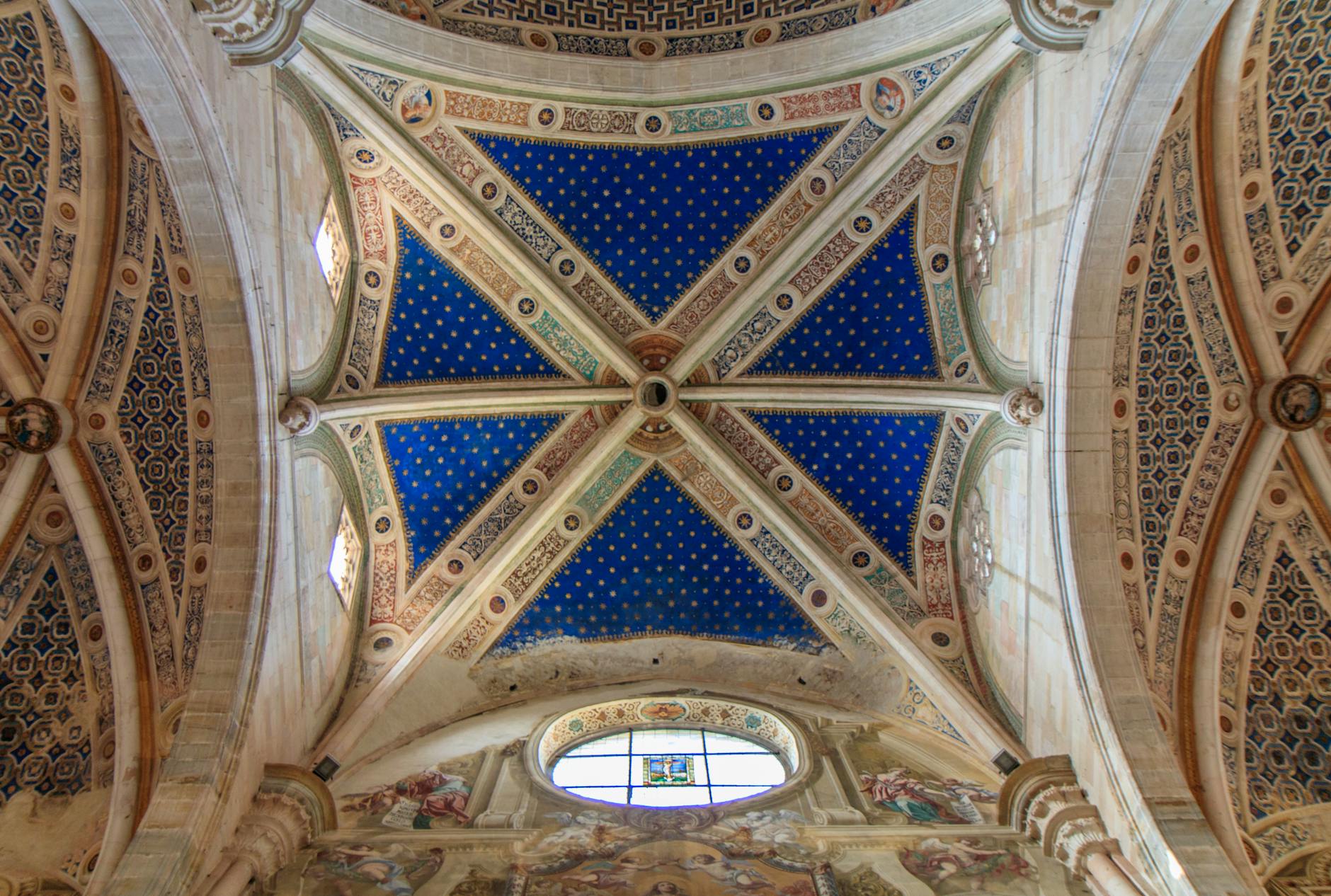 Explore the ornate beauty of Certosa di Pavia ceiling showcasing Gothic architecture.